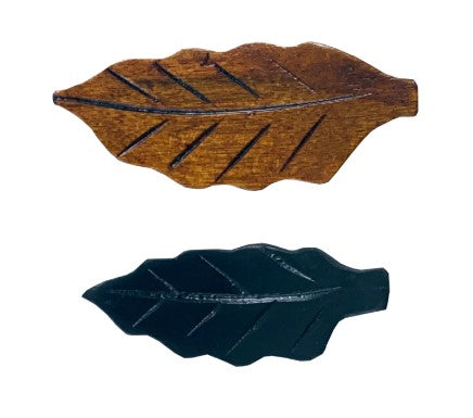 Leaf-shaped chopstick rest, ceramic design, perfect for adding elegance to table settings and keeping utensils clean.