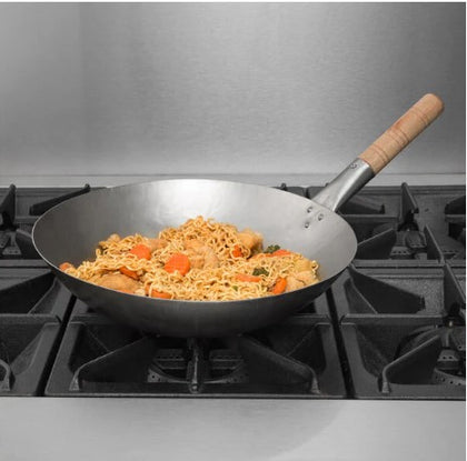 Twelve 14-inch Mandarin woks with wooden handles, designed for easy handling and authentic cooking experiences.