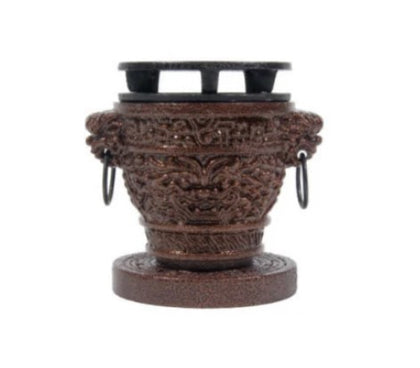 A Dragon Hibachi stove with a traditional design, perfect for grilling and cooking over an open flame.
