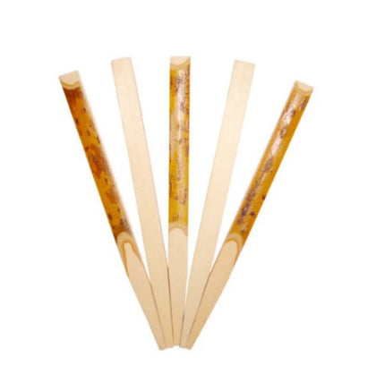 A wooden steak pick, designed for securely holding and serving steak, adding a rustic touch to your dining experience.