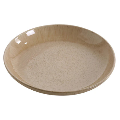 This salad and pasta bowl features a 10.5 inch diameter round shape with a 32 oz. capacity, constructed from durable porcelain for commercial foodservice durability. It is designed for compatibility with high-volume dishwashing, oven, and microwave use. Its glaze enhances resistance to scratching and staining, supporting daily use. The bowl's rounded form fits seamlessly into standard commercial prep and serving stations, streamlining workflow in institutional kitchens and casual dining venues.
