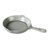 This pot plate features a practical handle making it simple to serve hot dishes in restaurants and cafes without hassle. Offers a durable melamine construction that resists breaking, ensuring long-term use and reliability in busy hotel dining rooms and catering services. It is suitable for both casual and upscale dining environments. It's perfect for serving side dishes or small portions, enhancing the dining experience in hotels and restaurants.