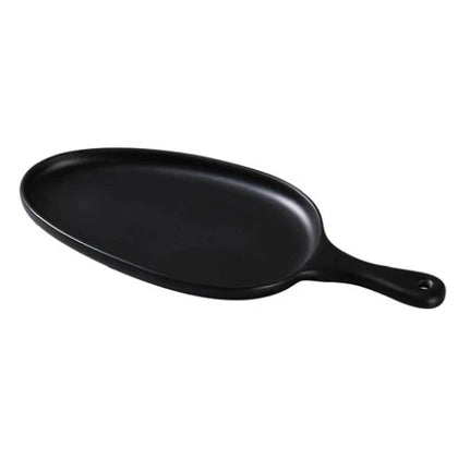 EcoQuality Pan Plate with Handle crafted from high-quality melamine, this plate boasts a sleek matte finish in an elegant black hue that will impress even the most discerning guests. The organic shape of the plate, with its unique curves and contours, adds a touch of sophistication to any dish you serve. Elevate your dining experience with these high quality affordable restaurant dinnerware.