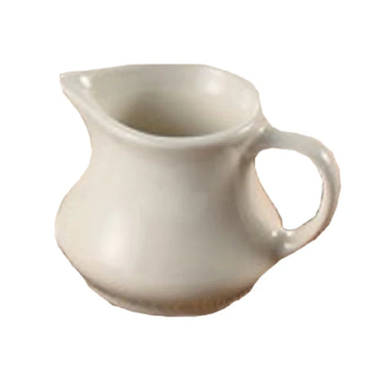 This creamer is designed for efficient beverage and condiment service, these porcelain creamers support medium-use environments with predictable performance and build quality. Suitable for steady workflows in institutional and cafeteria kitchens, these models enable manual pouring and durable handling in compact spaces, ensuring operational efficiency in diverse foodservice settings.