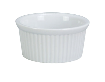 This Ramekin Dish is a professional grade porcelain container designed specifically for front and back of house foodservice applications. This round, fluted ramekin is ideal for precise portion control, garnishing, and presentation in commercial kitchens. Its durable porcelain construction ensures longevity while maintaining a high-quality aesthetic, suitable for busy restaurant, catering, and hospitality environments. 