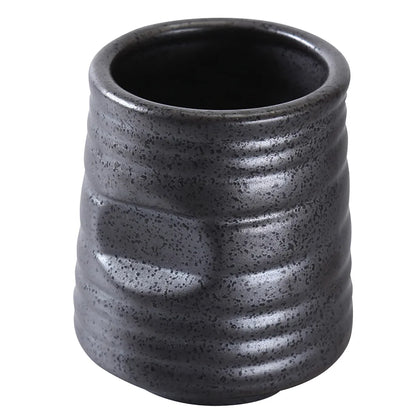 This black tea cup is made from durable porcelain, this cup is built to endure repeated use in food service operations. It holds 10 ounces, providing space for servings of tea or other hot drinks. Measuring 3.13 inches in diameter by 3.75 inches in height. High quality and affordable drinkware.