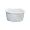 This Ramekin Dish is a professional grade porcelain container designed specifically for front and back of house foodservice applications. This round, fluted ramekin is ideal for precise portion control, garnishing, and presentation in commercial kitchens. Its durable porcelain construction ensures longevity while maintaining a high-quality aesthetic, suitable for busy restaurant, catering, and hospitality environments. 