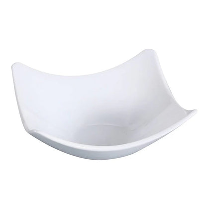 This sauce dish is crafted from durable high quality porcelain, this dish is suitable for high-frequency use in restaurants, catering, or institutional kitchens. Its oven and microwave safety facilitate versatile food presentation and service, making it a practical solution for portion control, condiment service, and sauce presentation in various commercial food environments, including mid-sized back-of-house settings. High quality affordable restaurant dinnerware.