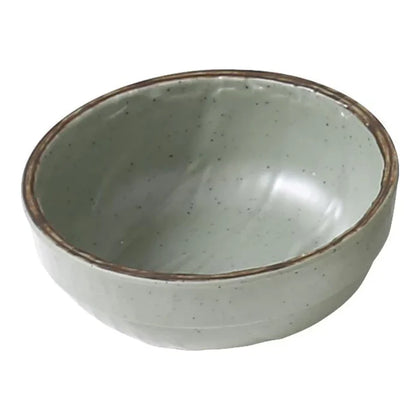 Miso soup bowl features a compact design ideal for serving miso soup and small portions, making it perfect for hotels, restaurants, and cafes where space efficiency is key. Offers a solid melamine construction that is break-resistant, ensuring durability and reducing replacement costs in high-traffic dining areas. Includes a stylish matte green finish that enhances the bowl's appearance and simplifies cleaning for busy foodservice operations.