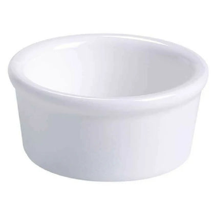 This smooth ramekin is a durable porcelain designed specifically for commercial foodservice applications requiring precise portion control and presentation. The ramekin's sleek design and practical size make it perfect for serving sauces, condiments, and small desserts. This round ramekin offers reliable performance in settings such as catering, institutional kitchens, and restaurant prep stations. Its high-quality porcelain material ensures microwave, oven, and dishwasher safe.