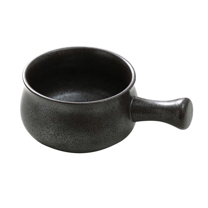 This skillet bowl comes with a lid to retain heat and enhance cooking results. Made of durable porcelain, it’s dishwasher, oven, and microwave safe for easy cleaning and use. Its sleek black finish adds a stylish touch to any kitchen or dining table suitable for restaurants, cafes, and home use. High quality affordable restaurant dinnerware.