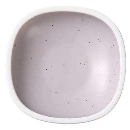 This porcelain square sauce dish features a glazed finish and is both dishwasher and microwave safe. Its durable porcelain construction ensures longevity in demanding settings, making it suitable for institutions, restaurants, cafés, and catering operations that require reliable, easy-to-maintain serveware for sauces, condiments, or small food portions.