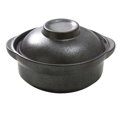 This skillet bowl comes with a lid to retain heat and enhance cooking results. Made of durable porcelain, it’s dishwasher, oven, and microwave safe for easy cleaning and use. Its sleek black finish adds a stylish touch to any kitchen or dining table suitable for restaurants, cafes, and home use. High quality affordable restaurant dinnerware.