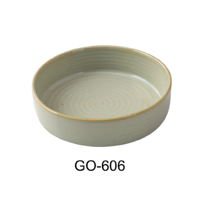 This bowl is earthy tone complemented by a golden rim enhances presentation quality while maintaining durability and microwave and dishwasher resistance ideal for consistent daily use in busy foodservice environments. The sturdy porcelain construction ensures longevity and compatibility with high-volume cafeteria, banquet, or restaurant settings, supporting efficient service while preventing chipping or staining over time.