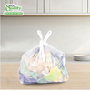 Small white plastic shopping bags with handles for groceries and retail