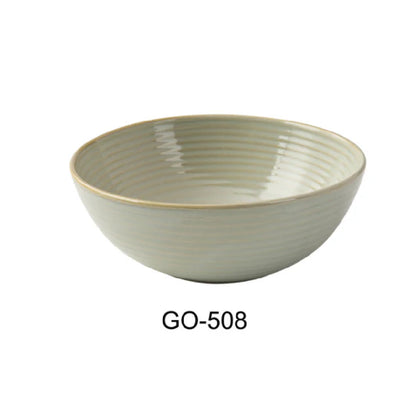 This bowl is earthy tone complemented by a golden rim enhances presentation quality while maintaining durability and microwave and dishwasher resistance ideal for consistent daily use in busy foodservice environments. The sturdy porcelain construction ensures longevity and compatibility with high-volume cafeteria, banquet, or restaurant settings, supporting efficient service while preventing chipping or staining over time.