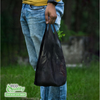 Large black plastic shopping bags with handles for retail and grocery use