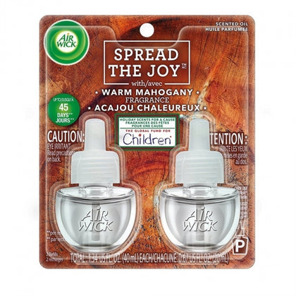 Air Wick Scented Oil Warm Mahogany brings a cozy, comforting ambiance to your home with the rich aroma of mahogany wood, accented by fresh holly and winter berries. Infused with natural essential oils, this fragrance delivers a warm and inviting experience that’s perfect for chilly days. Each refill provides long-lasting scent, and the adjustable plug-in warmer offers five fragrance settings to suit your preference. Ideal for use in any room, including living areas, bedrooms, kitchens, and bathrooms.