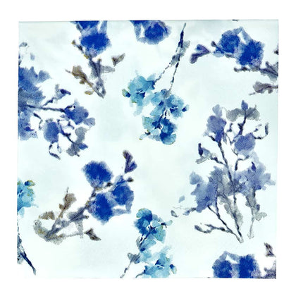 Blossoms Lunch Napkin available in Blue, Pink, and Yellow. Bright and cheerful disposable napkins perfect for parties, events, or casual dining. Made with premium, absorbent material for a stylish touch.