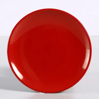 Yanco Round Plate CR-1309 This affordable and stylish restaurant tableware is made from durable melamine, giving it the look of ceramic. Perfect for serving a variety of dishes, from cakes and appetizers to hot meals, this plate adds a touch of elegance to any setting. The Black & Red collection features a classic red design that complements any restaurant, whether you're serving Italian, Japanese, or American cuisine. 