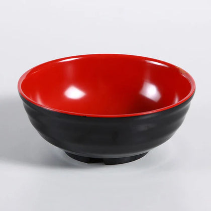 Yanco Noodle Bowl CR-538 It is made from durable and reliable melamine material, which makes the bowl look like ceramics. You can use these unique round bowls to serve such Asian dishes like rice, miso soup, noodles or salads. Thanks to the stylish Black & Red collection style, the bowl will perfectly fit any food-serving establishment design. Melamine tableware is an ideal solution for those who choose high-quality, durable and affordable dinnerware for presenting their food. 