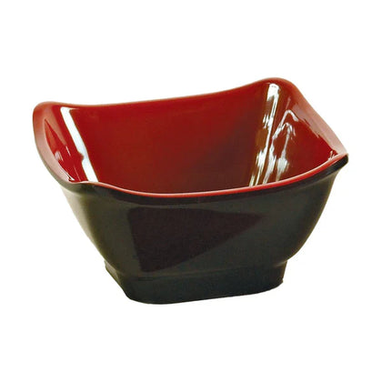 Yanco Square Bowl CR-5450 is a great and affordable restaurant tableware. It is made from durable and reliable melamine material, which makes the bowl look like ceramics. You can use these unique square bowls to serve such Asian dishes like rice, miso soup, noodles or salads. Thanks to the stylish Black&Red collection style, the bowl will perfectly fit any food-serving establishment design. 