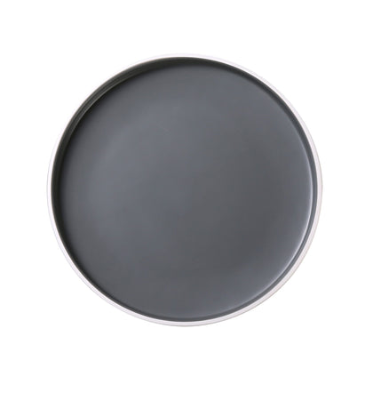 Yanco Round Plate DI-308 This round plate boasts a sleek and modern design, with a grey interior and white exterior that will complement any table setting. Measuring 8