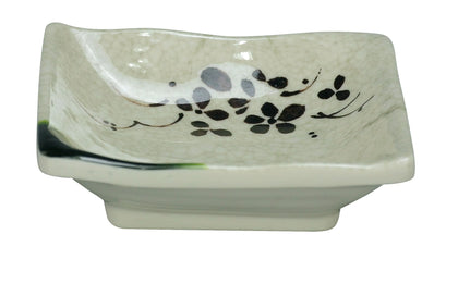 Yanco Square Sauce Dish HO-2404 is a perfect solution to serve sauces, dips, spices, and herbs that accompany the oriental dishes in your food-serving establishment. Thanks to the high-quality, reliable and affordable melamine material, these sauce dishes can With stand the heavy commercial use. While looking like they are handmade ceramics such dishes won't chip, break, or stain. The Honda collection is performed in Japanese style, that will perfectly fit most of the establishments' designs.