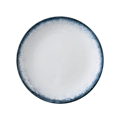 Yanco Coupe Round Plate PR-707 offers a sleek and contemporary presentation for bread, butter, or small appetizers. Its clean white surface, framed with a bold midnight blue rim, adds a stylish accent to casual and upscale dining settings alike. Crafted from durable porcelain, it’s a reliable choice for high-volume environments.