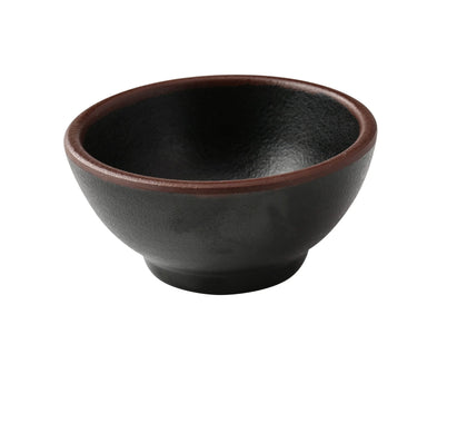 Yanco Sauce Dish NA-5003BK Made from high-quality melamine, this server is both durable and lightweight. Its round shape and break-resistant nature make it suitable for frequent use in commercial dining environments. This server is designed to be dishwasher safe, ensuring convenient and efficient cleaning, essential for high-turnover settings. The black color with a speckled finish and brown rim adds a sophisticated touch to the presentation of sauces and condiments. 