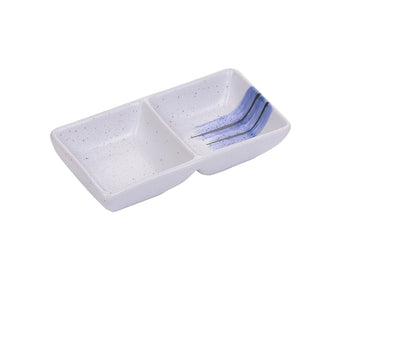 Yanco Double Sauce Dish OC-4031 is a stylish and practical addition to your tableware collection. Featuring two 2-ounce compartments, this rectangular dish is perfect for serving sauces, dips, or condiments. Crafted from high-quality porcelain with a durable glazed finish, it offers both elegance and long-lasting performance. The dish showcases a sophisticated white and blue Ocean Collection design, enhancing the presentation of your meals. 