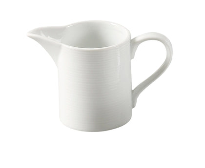 Yanco Creamer PA-PC is a refined addition to any restaurant, café, or hotel beverage service. Designed for serving cream, half & half, or milk alongside coffee and tea, this creamer features a well-defined spout and a petite handle for easy pouring. Crafted from durable porcelain, it withstands heavy daily use while maintaining an elegant, super white finish that enhances table presentation. 