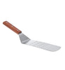 Durable perforated spatula for cooking and draining.
