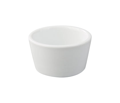 EcoQuality Ramekin RK-301 is a compact, bright white porcelain condiment dish designed for sauces, dips, sides, garnishes, and small dessert portions. Its smooth, classic finish makes it a versatile choice for restaurants, catering setups, bakeries, and home kitchens looking for a clean and modern tabletop detail. Durable and easy to stack, this 1 oz ramekin is a reliable essential for any service environment.