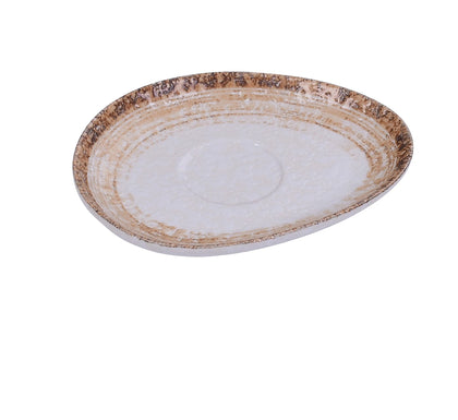 Yanco Saucer RO-002 is a stylish and functional addition to any tableware collection. Featuring an elegant oval shape and a beautiful white and brown glazed finish, this saucer complements a variety of table settings. Crafted from high-quality porcelain, it is designed for durability and long-term use in restaurants, cafés, and hotels. Its smooth surface enhances presentation, making it perfect for serving coffee, tea, desserts, or appetizers. 