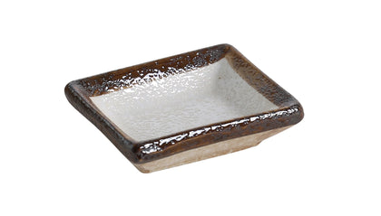 Yanco Rectangular Sauce Dish RO-4046 is crafted from high-quality porcelain, making it a reliable choice for serving sauces, dips, spices, and herbs. With a sleek glazed finish, this dish features a crisp white design that complements any table setting, making it ideal for restaurants, catered events, outdoor dining, and hotels. With a 2-ounce capacity, it provides the perfect portion for condiments and accompaniments. Designed for convenience and durability, it is dishwasher, oven, and microwave safe. 