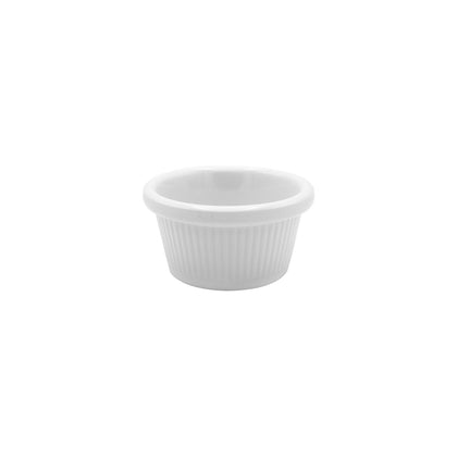 Fluted white ramekin with 1.5oz capacity and 2-1/2 inch diameter, ideal for sauces and condiments; elegant, durable design perfect for restaurants, catering, or stylish home use.