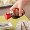 12-pack of new red top soy sauce bottles, perfect for restaurants and home kitchens.


