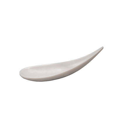White tasting spoon with 0.5oz capacity and 5-3/4 inch length, clean and modern design, ideal for food sampling, appetizers, or amuse-bouche in restaurants, catering, or events.