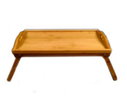 A bamboo serving tray with legs, designed for easy serving and versatility, perfect for breakfast in bed or as a stylish tabletop.
