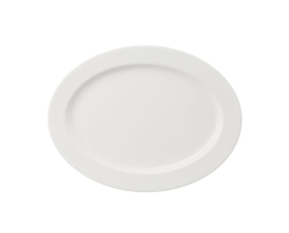 Yanco Platter VS-212 offers a graceful and durable option for presenting main courses, shared dishes, or elegant entrée displays. Crafted from fully glazed porcelain with a strong magnesia body, this bone white platter from the Versailles collection enhances fine dining experiences in restaurants, hotels, and special events.