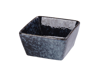 This Square Sauce Dish is a stylish and functional addition to any table setting. Crafted from high-quality porcelain with a smooth glaze finish, this square dish features a striking blue star design that enhances food presentation. Measuring 3 1/2