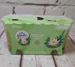 Glade Candle Bamboo & Waterlily Bliss, 3.4 oz scented candle in glass jar with fresh, calming bamboo and waterlily fragrance